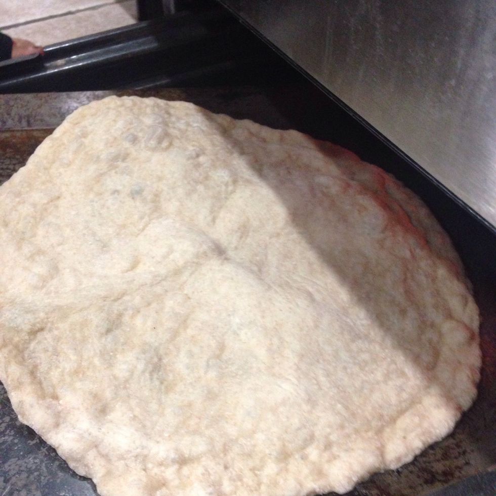 Or take it under the oven surface where heat can reach the surface of the bread, following this step could make the bread bubbled and crispy.