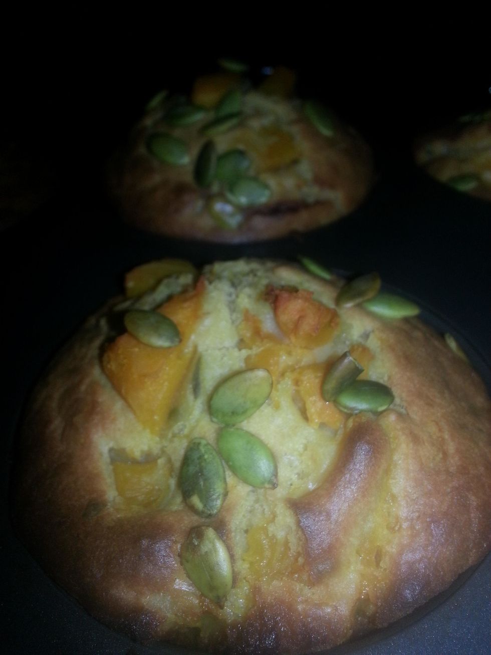 or until the muffins are well risen and a skewer inserted in the center comes out clean