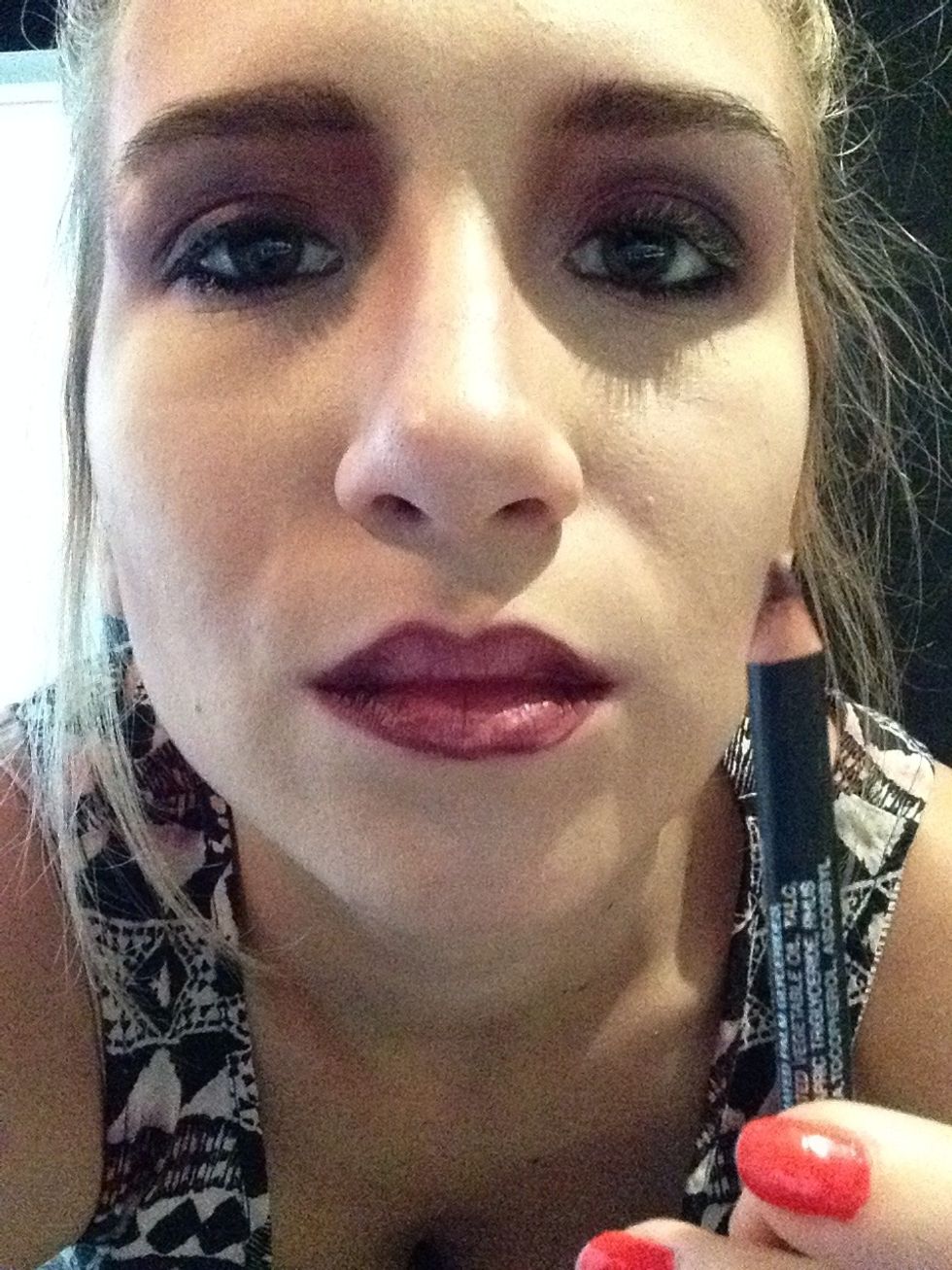 Or you can be more glamourous. With a dark lip pencil draw your lips and dark the corner