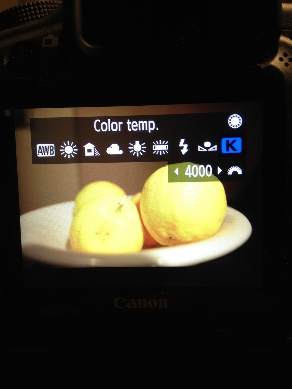 Or you can fine tune your white balance by using the 'colour temp' option. Point the camera at something white and adjust until it looks balanced between yellow and blue tones.