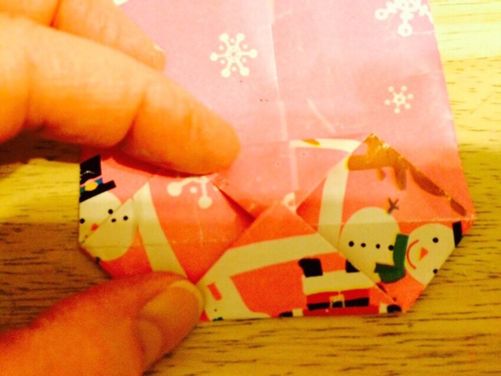 Other side overlapping. Remember, this is the bottom of the bag.