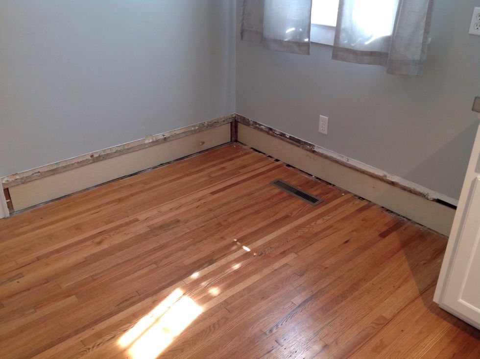 Our baseboards left an empty cavity behind, so I filled the space with additional plywood.