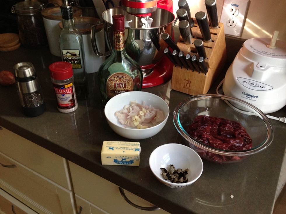 Our cast of characters. Chop the shallot and garlic and the truffles. Halve the livers and trim any white connective tissue away. Leave the butter out to warm up.