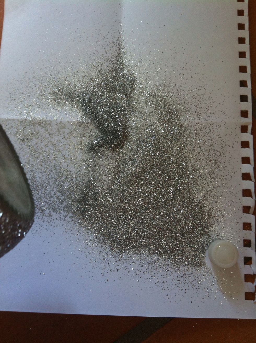 Our glitter on paper and roll jar through it while paint is still wet