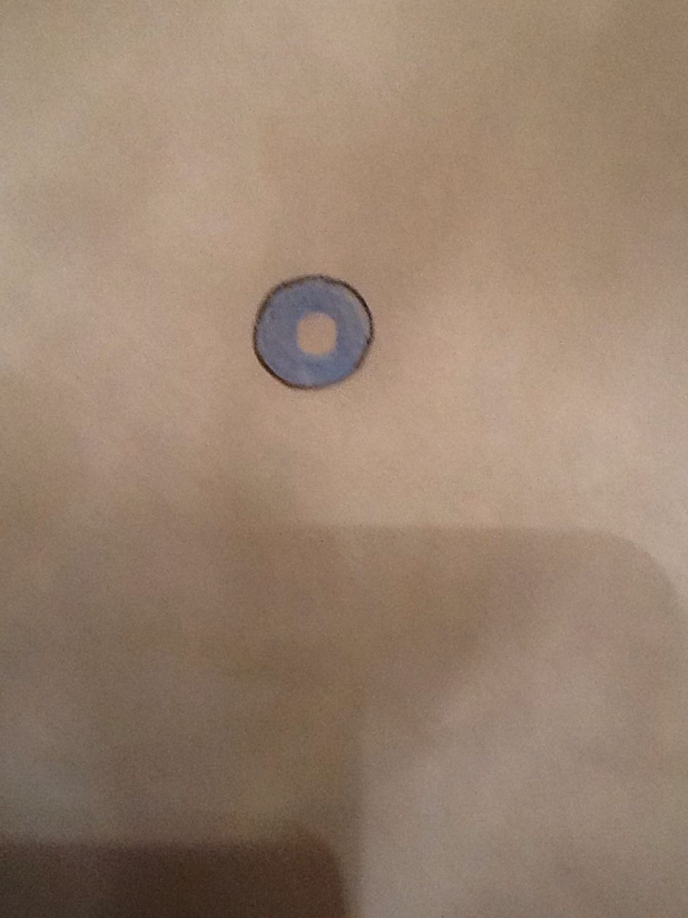 Out line the coloured circle in black.