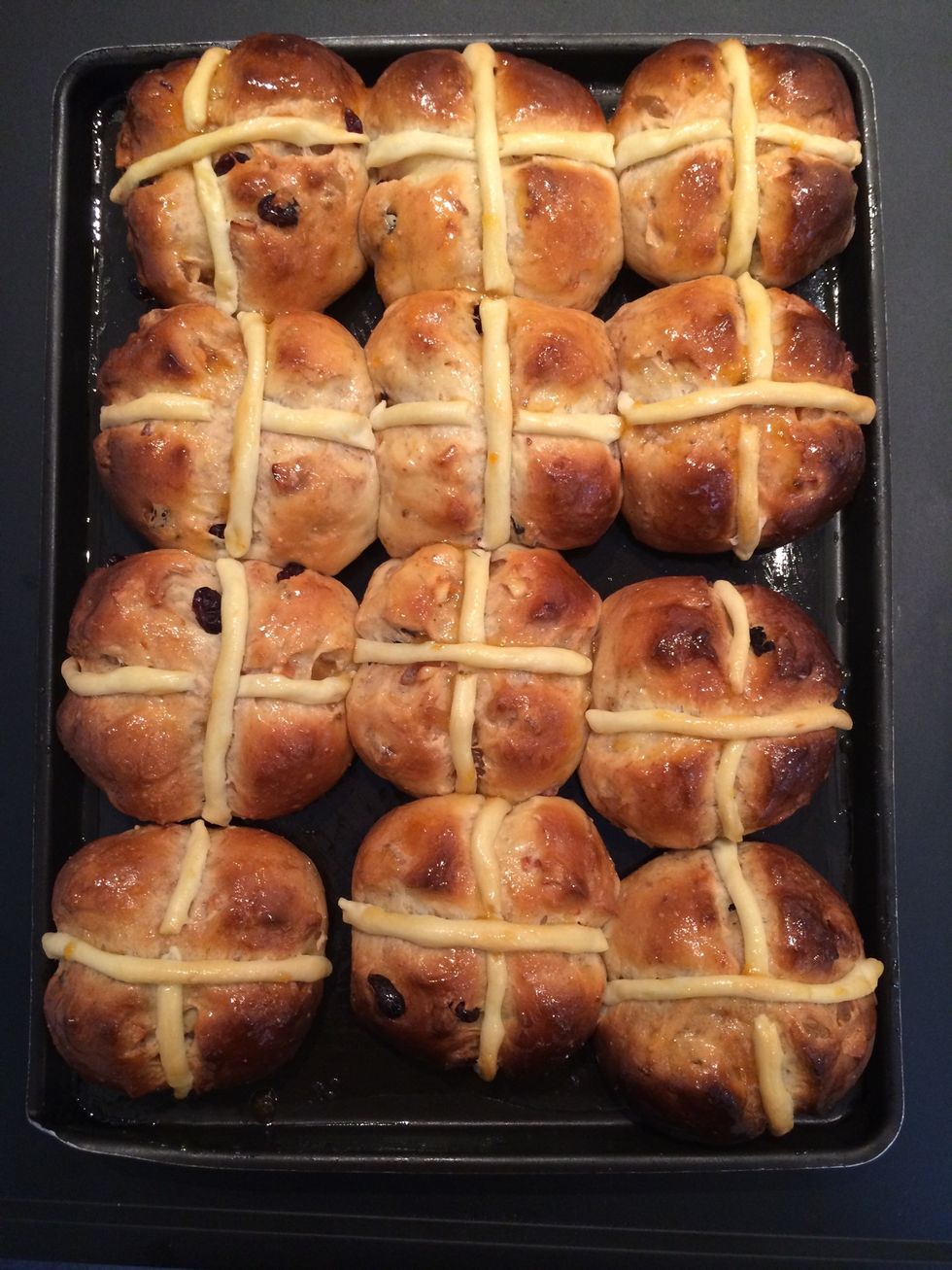Out of the oven. Glaze with apricot jam that has been heated to make it liquidly and spreadable