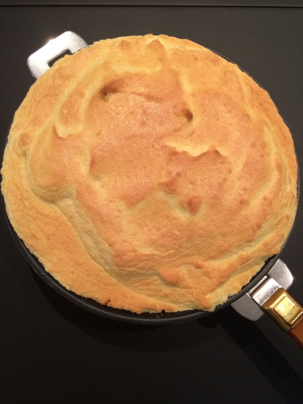 Out of the oven. Light golden and still moist inside like a souffl\u00e9 should be