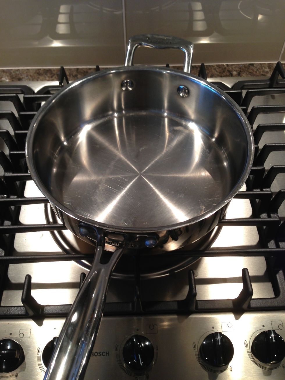 Out saut\u00e9 pan on med - low heat to warm it up