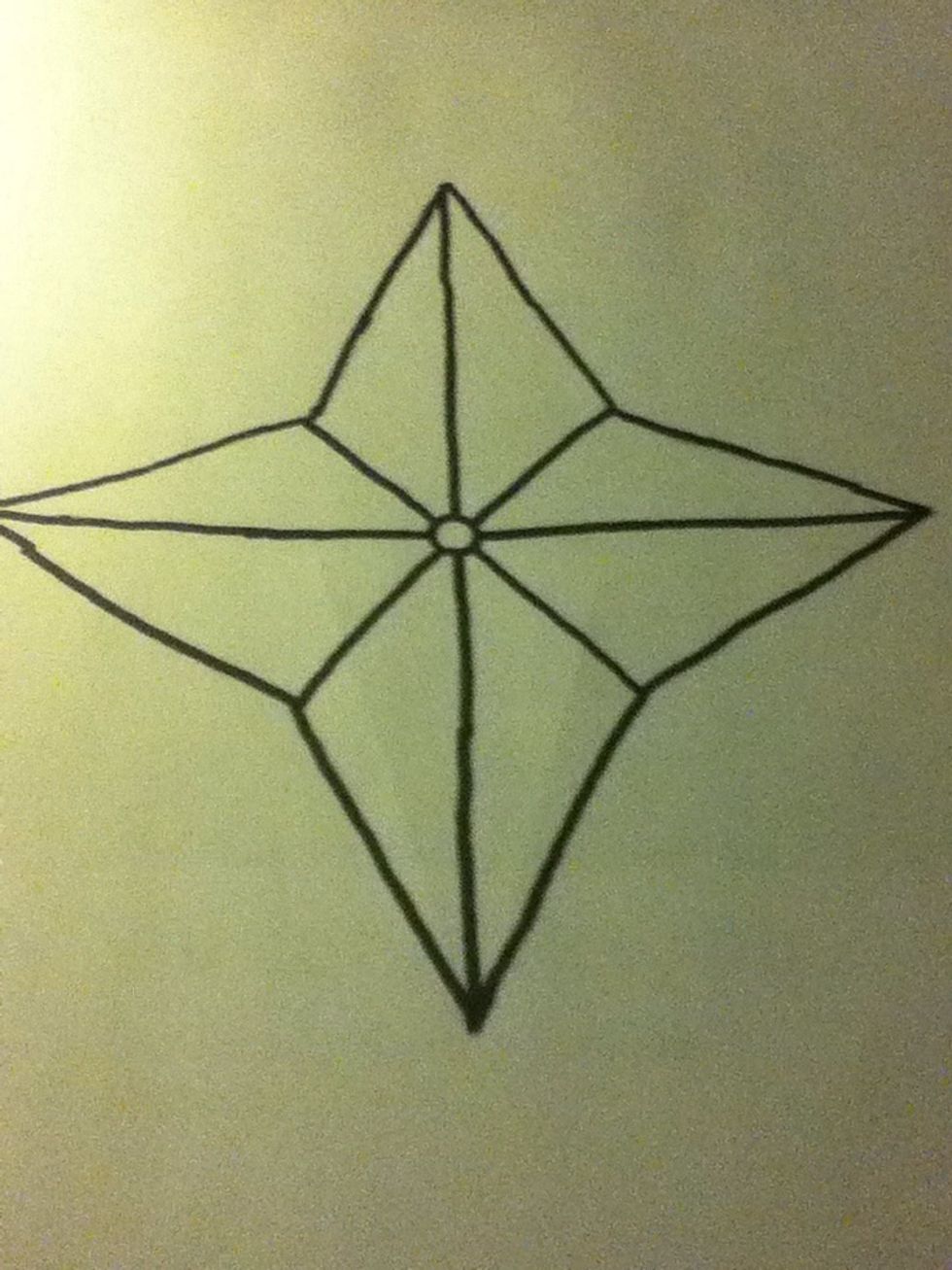Outline all pencil lines with a sharpie. Let the ink dry and erase the stray pencil lines for a cleaner looking star.