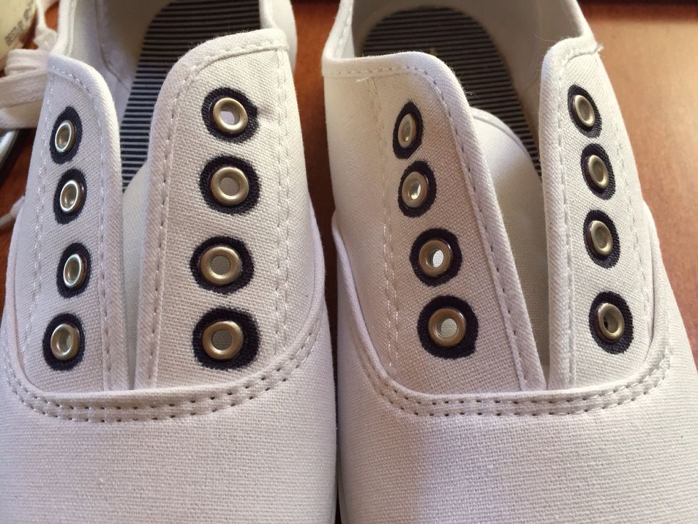 Outline around eyelets.