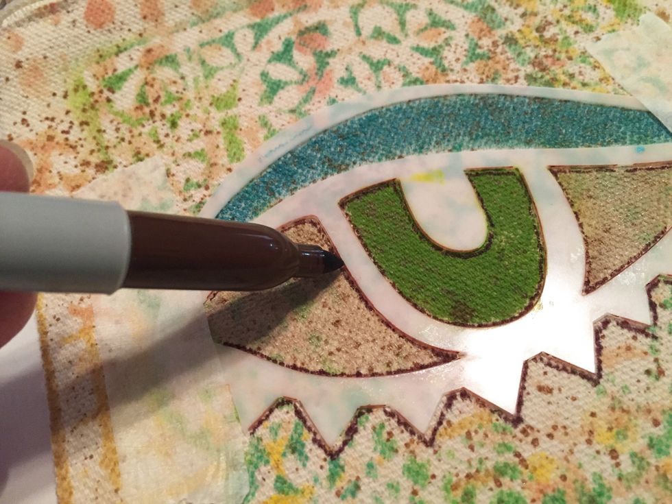 outline eye using brown sharpie. move tape if needed.