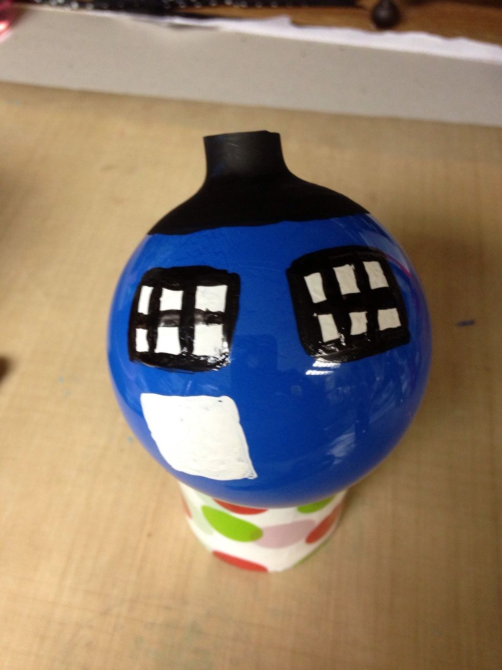 Outline 'windows' with nail polish.