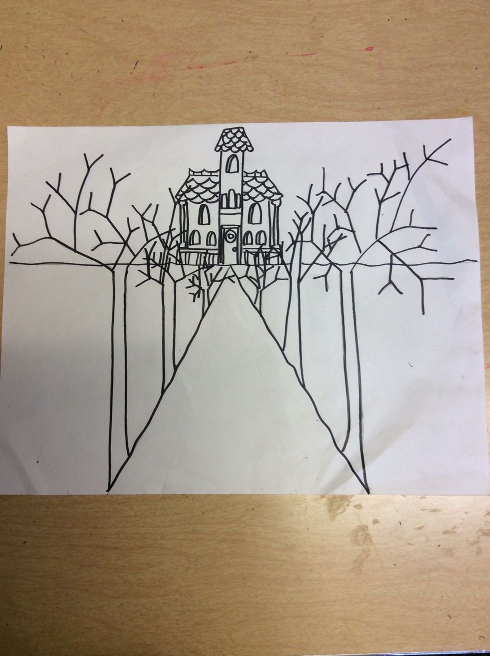 Outline with black permanent marker and erase your pencil marks