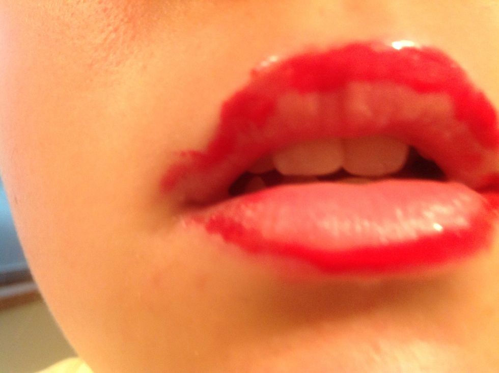 Outline your lips with the lipgloss ( excuse the horrible lines)!