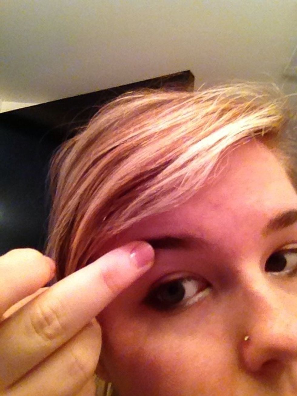 Outwards from center of eye brow out to the end. Blend