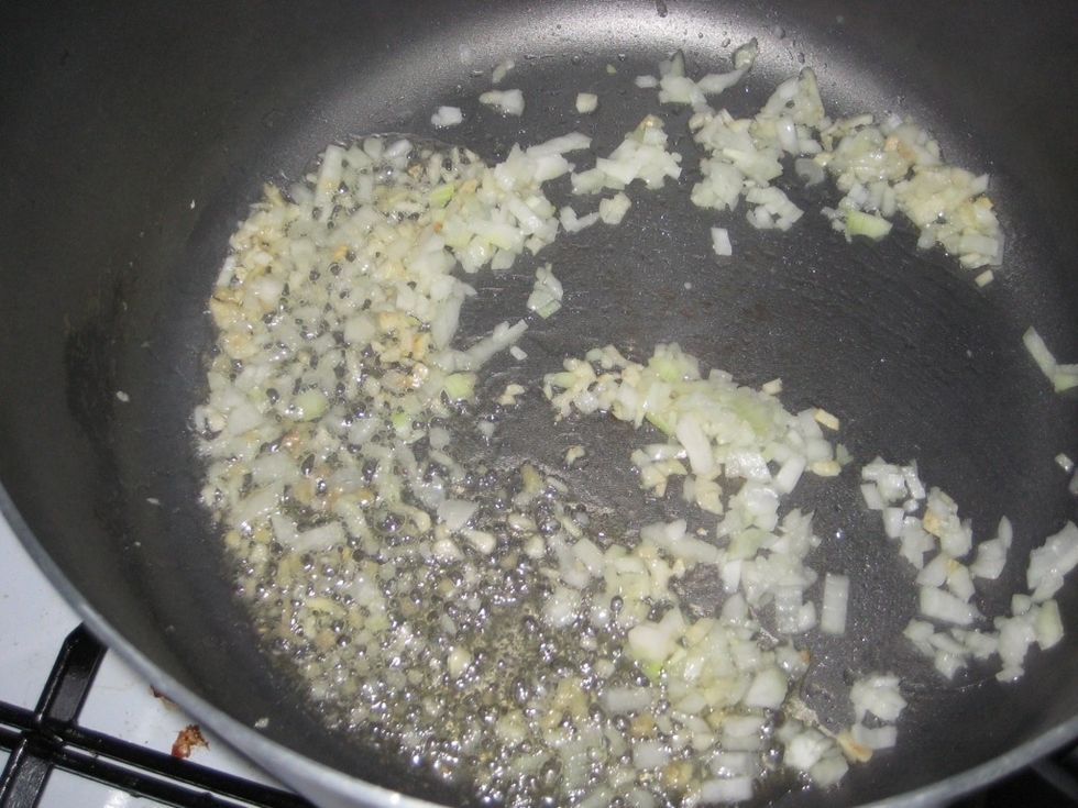 Over high heat, stir fry the onion, ginger and garlic. Use minimal oil. This should take less than a minute, we do not need the onion to brown.
