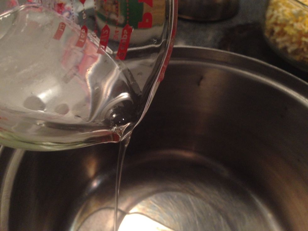 Over low heat, put 1/4 of a cup of organic coconut oil in a pot.