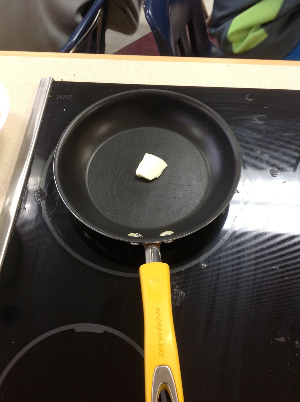 Over medium heat melt a sliver of butter.