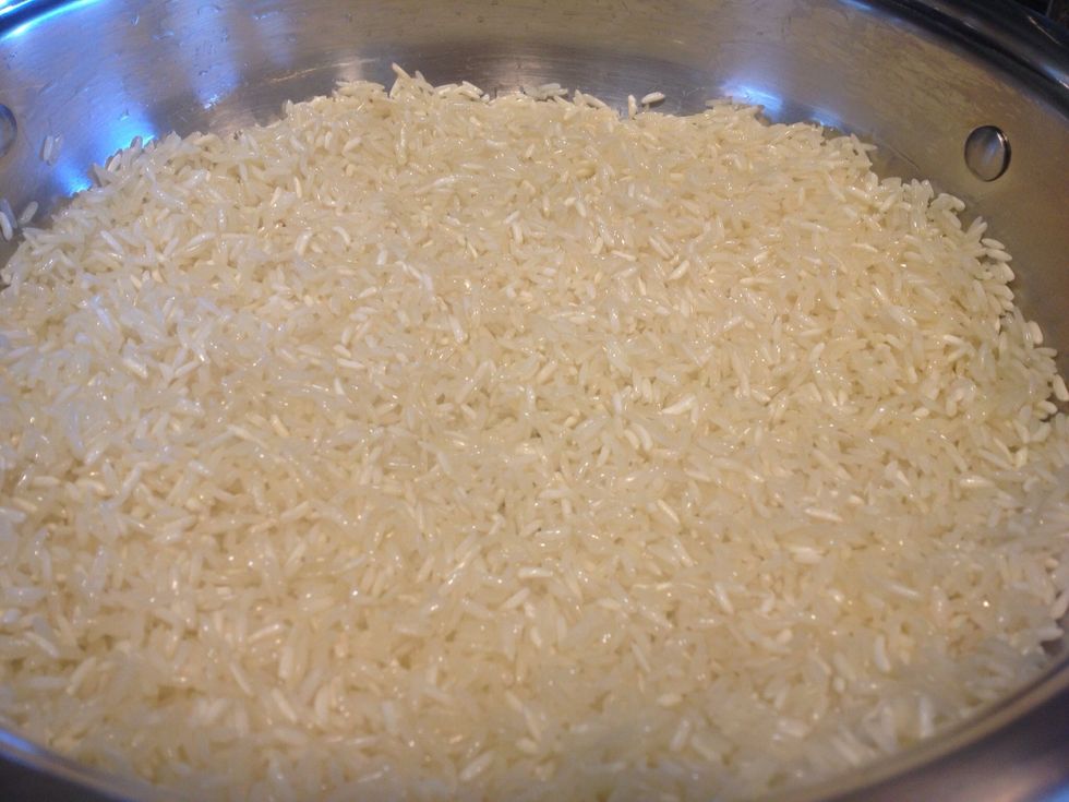 Over medium low heat (more low than medium) add the oil and rice. You don't need much oil, just enough to wet all of the rice. Start browning, mixing very often.