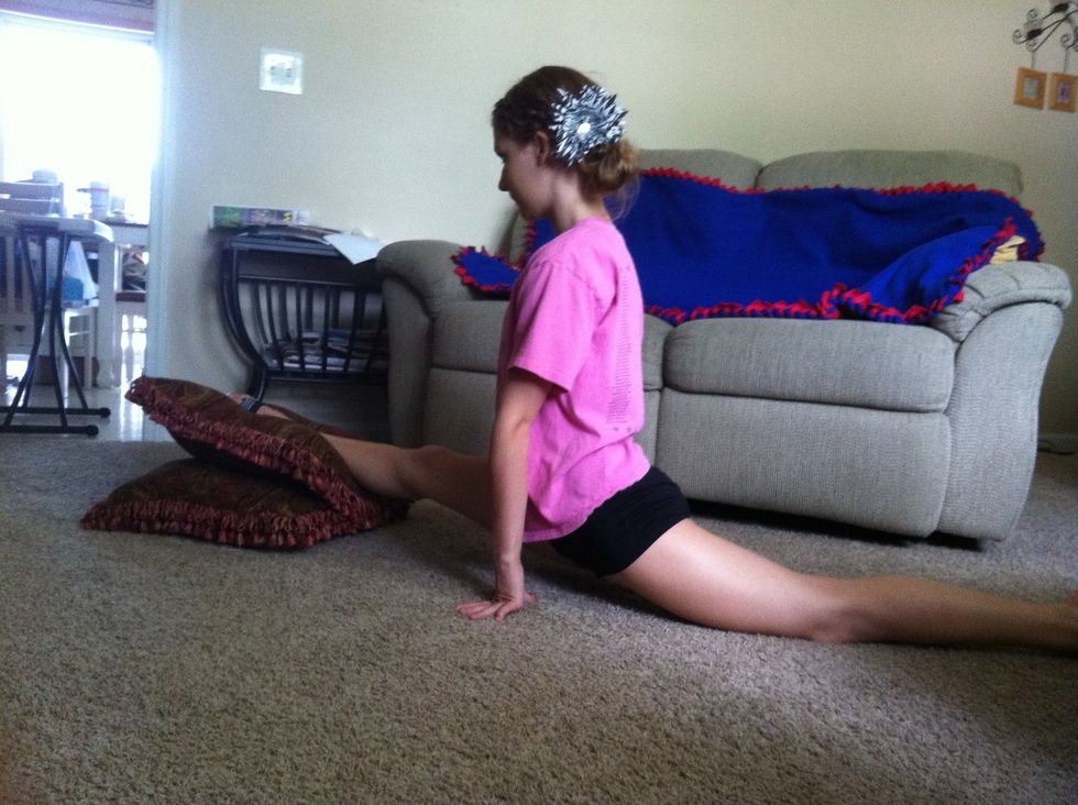 Over splits are a great thing to go. I use pillows or a box, mats, what ever you can find that is good for you. Make sure you legs are straight, you don't want to get in the habit of bad technique!