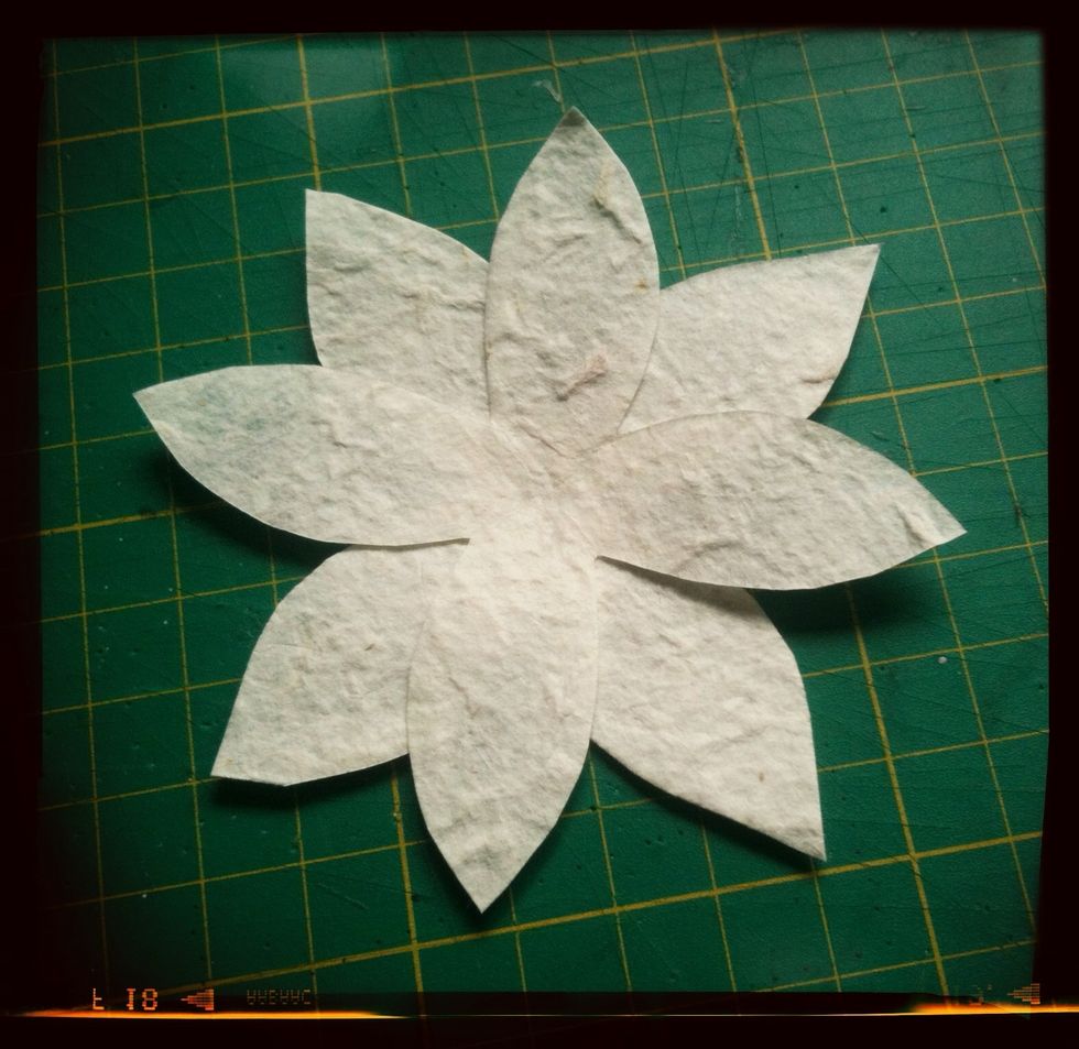 Overlap the flowers and glue in place, I used tacky glue because it sticks fast but most craft glues will work fine.