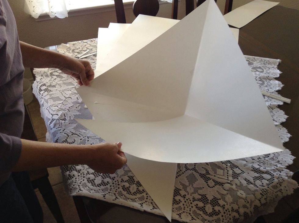 Overlap triangles to form a pyramid.