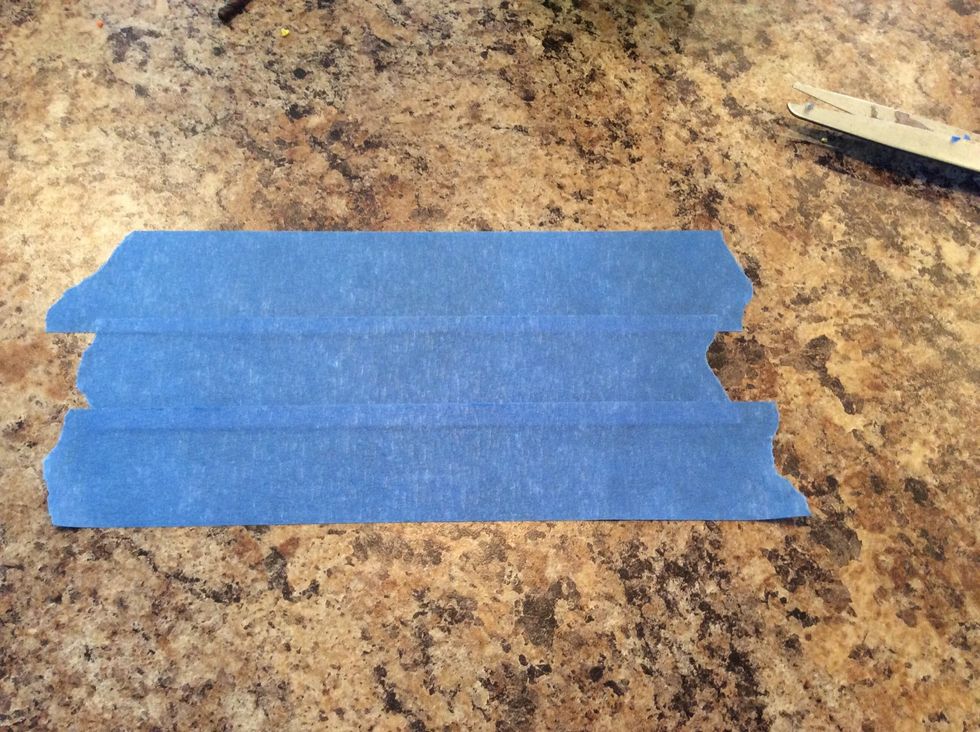 Overlap your strips so you get a large piece of tape that stays together