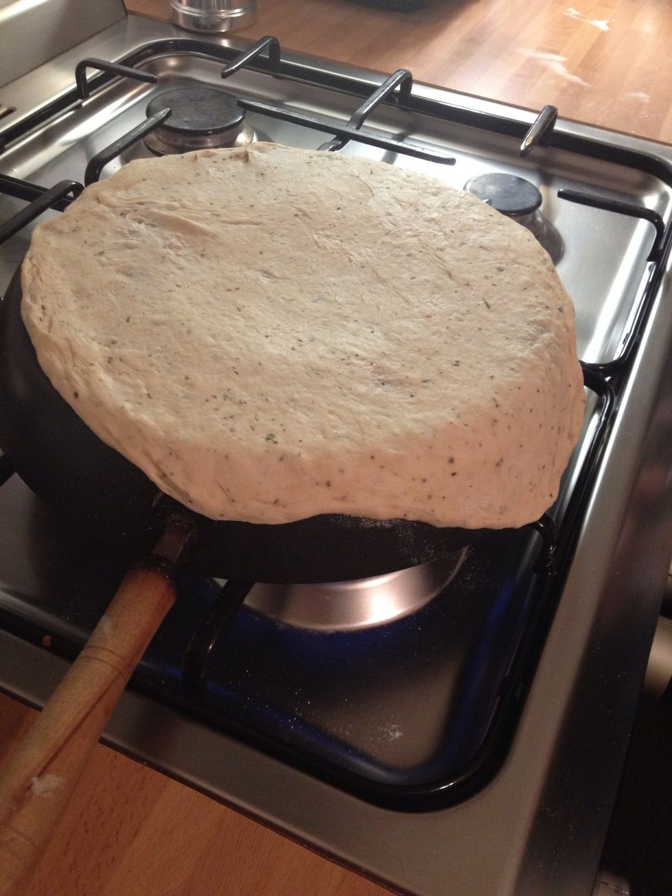 OVERTURN the super hot frying pan and add the rolled dough... Listen and watch it whilst adding the toppings