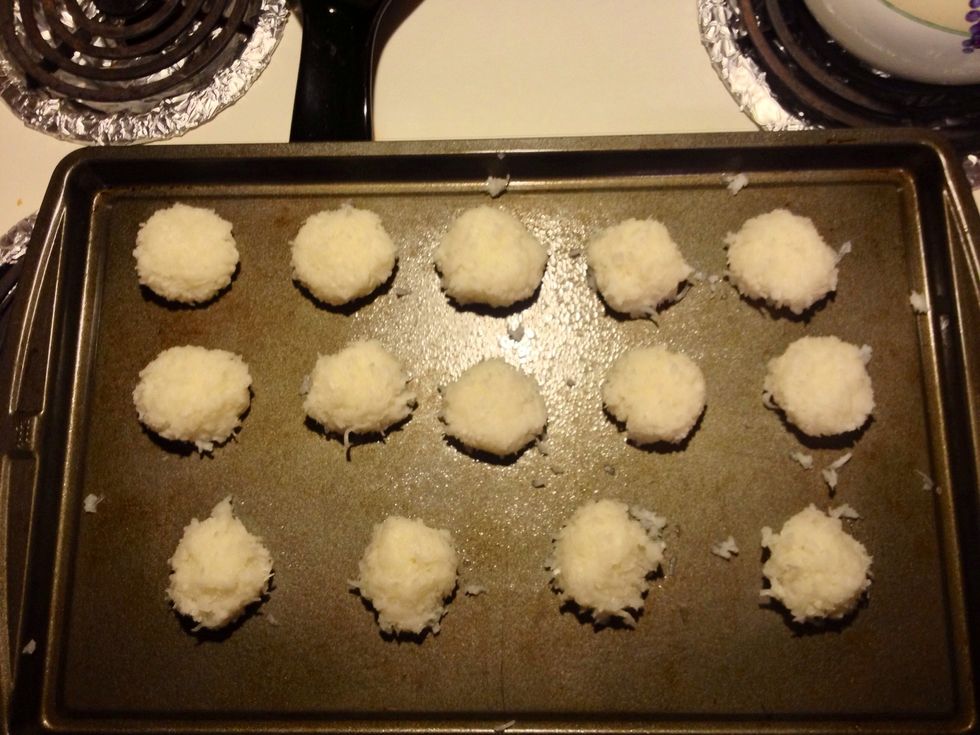 Pack about a tablespoon and a half of mix together in your palms and shape it to form a thick disc; keep in mind it will be fairly wet. You'll end up with about 25 macaroons(mine are a little larger).