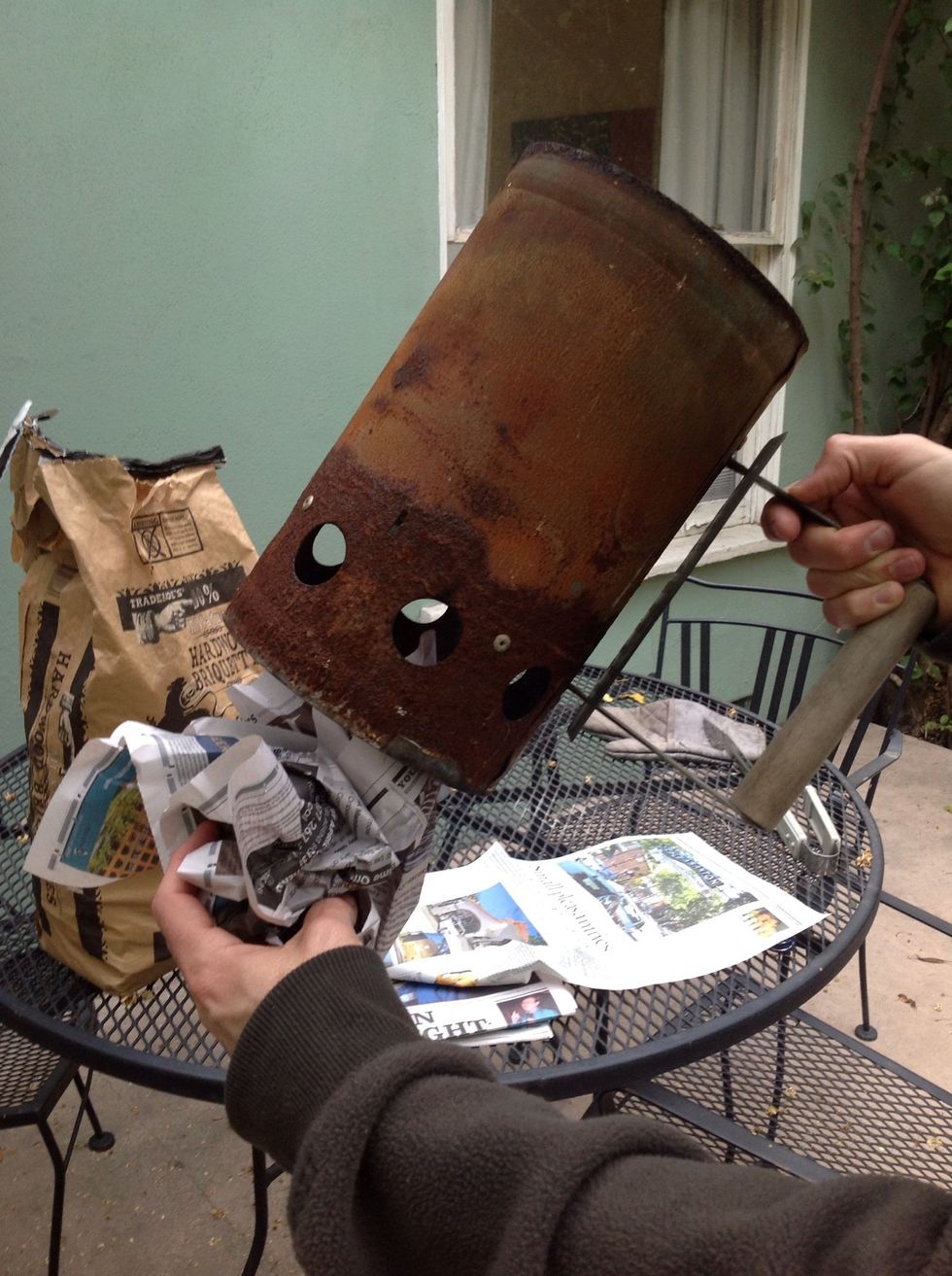 Pack ONE sheet of newspaper in bottom of chimney
