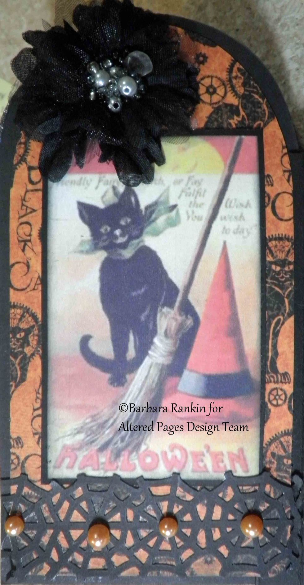 Page 2 left: Altered Pages AP288-Happy Halloween collage sheet image, Petaloo flower, punched spiderweb border, pearls.