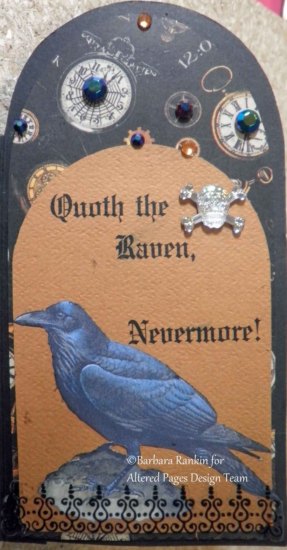 Page 5 right: Computer generated quote onto orange tag, Raven fussy cut from AP-1820 Quoth the Raven Nevermore collage image, wrought iron sticker, gem stones.