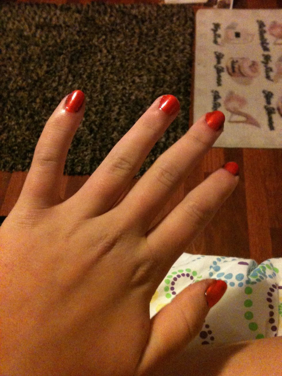 Paint a base coat of orange on your nails. I used Hot Tamale from Pure Ice.