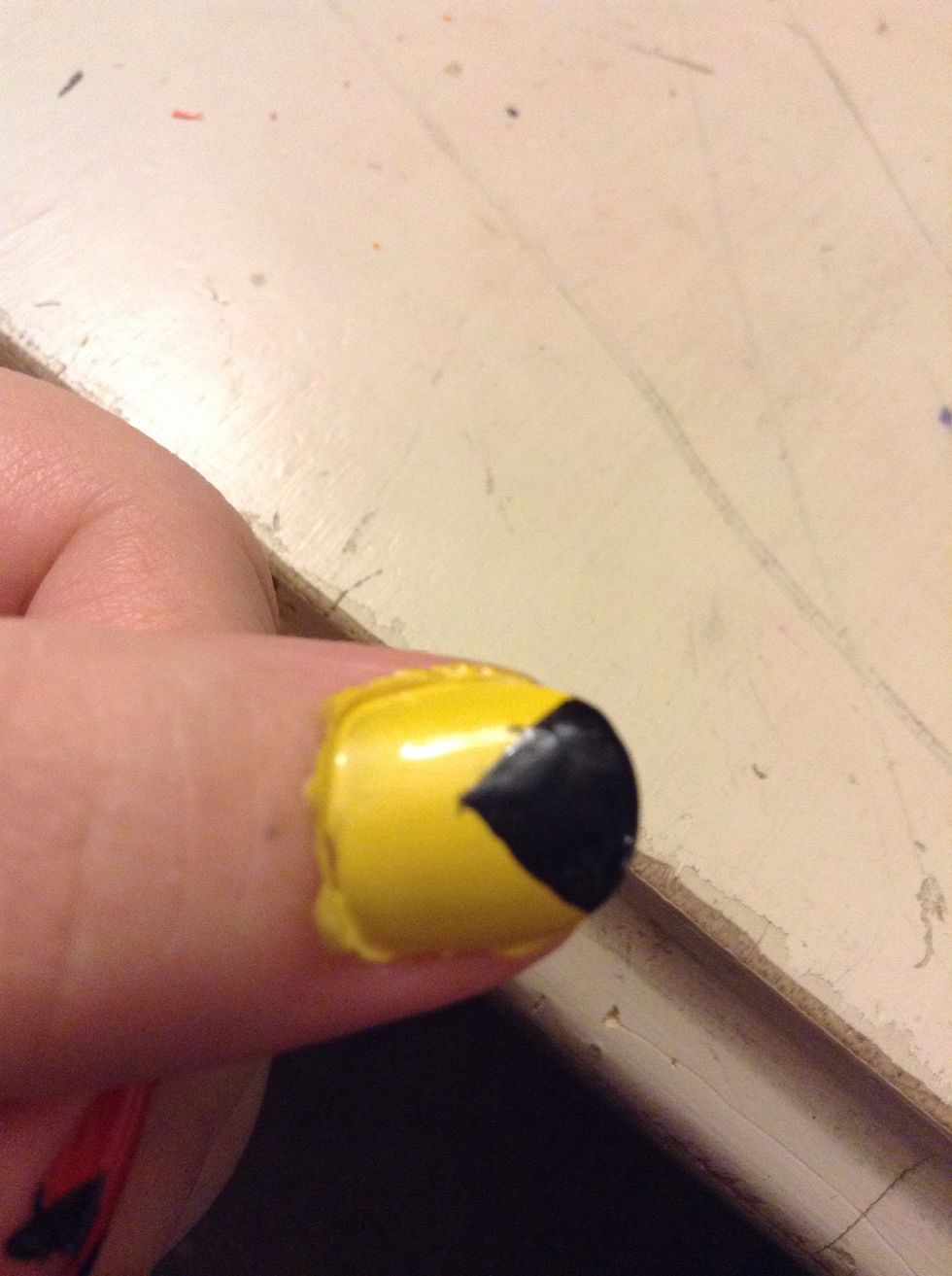 Paint a black triangle like this for PacMan's mouth.