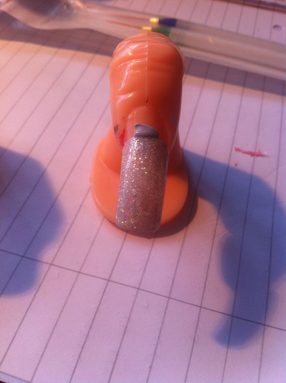Paint a layer of glitter nail polish...