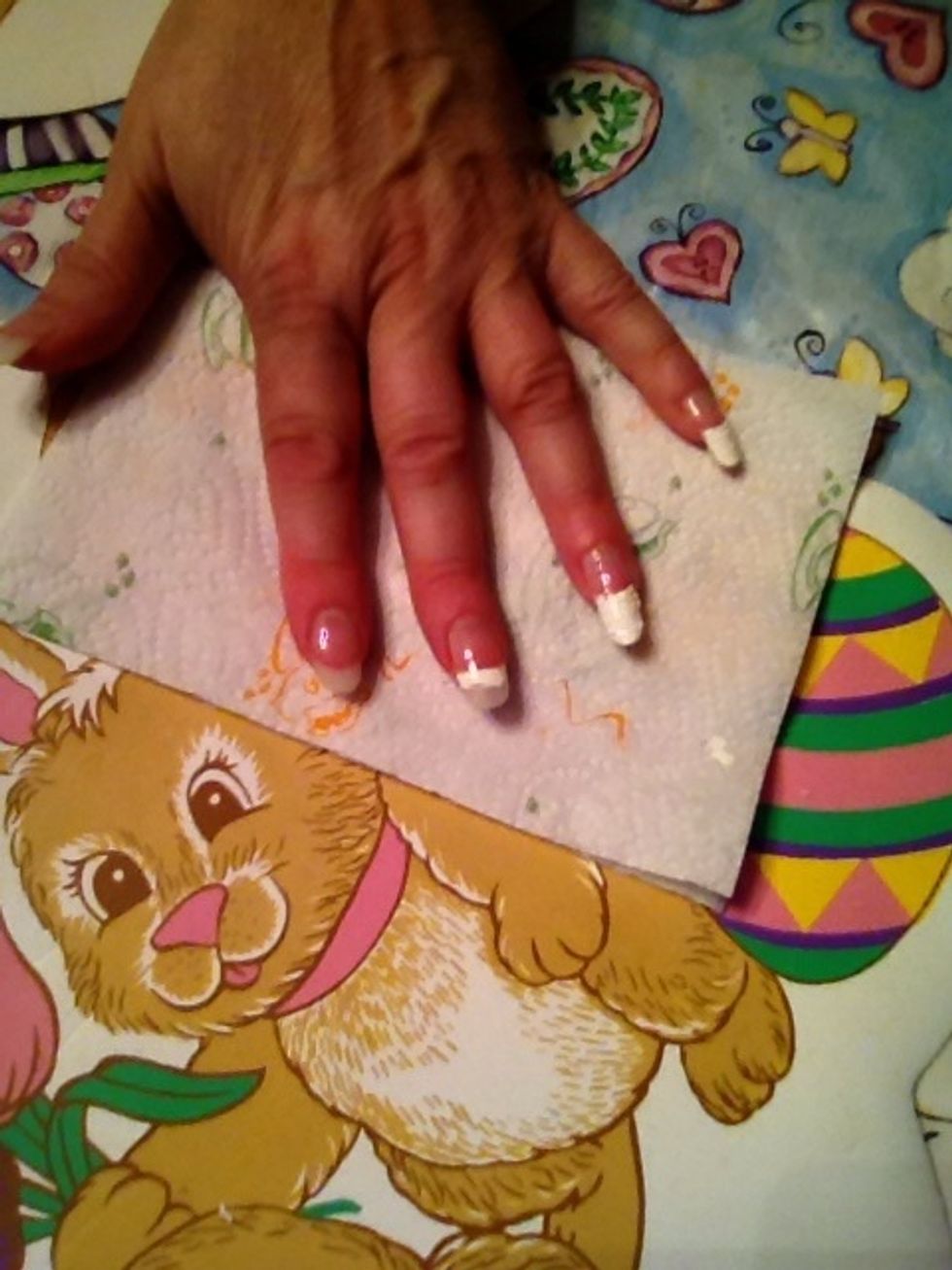 Paint a line across the tip of the fingernail with the white polish, then paint in the rest of the tips of the  nails that have a white look to them.