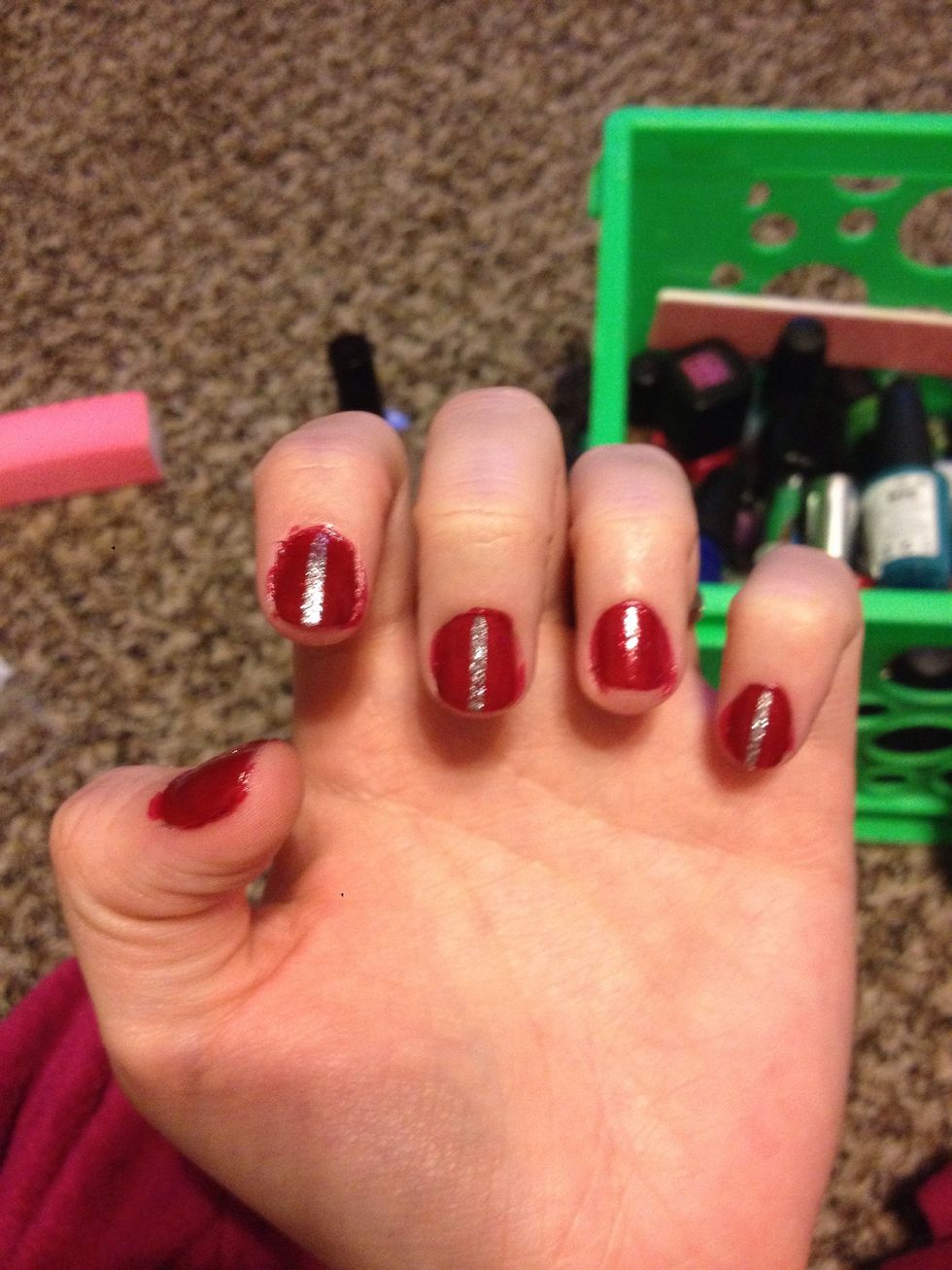 Paint a line down the middle of all your nails, EXCLUDING the ring finger