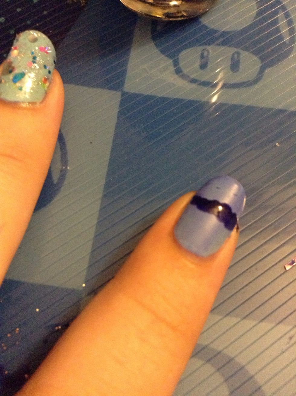 Paint a line half way up your nail whatever color you want the 'cup' part.