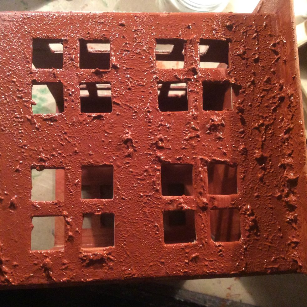 Paint a nice coat of acrylic paint. I used burnt umber because I wanted it to look like gingerbread. Go back with a sponge and create texture with the paint.
