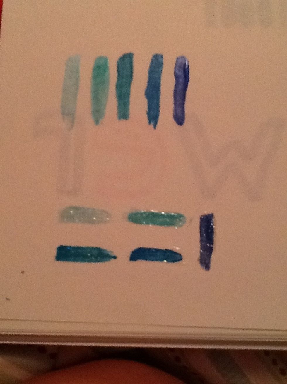 Paint a small spot on the paper, in order of lightest to darkest. I did it again at the bottom and added glitter polish to see if I liked that.