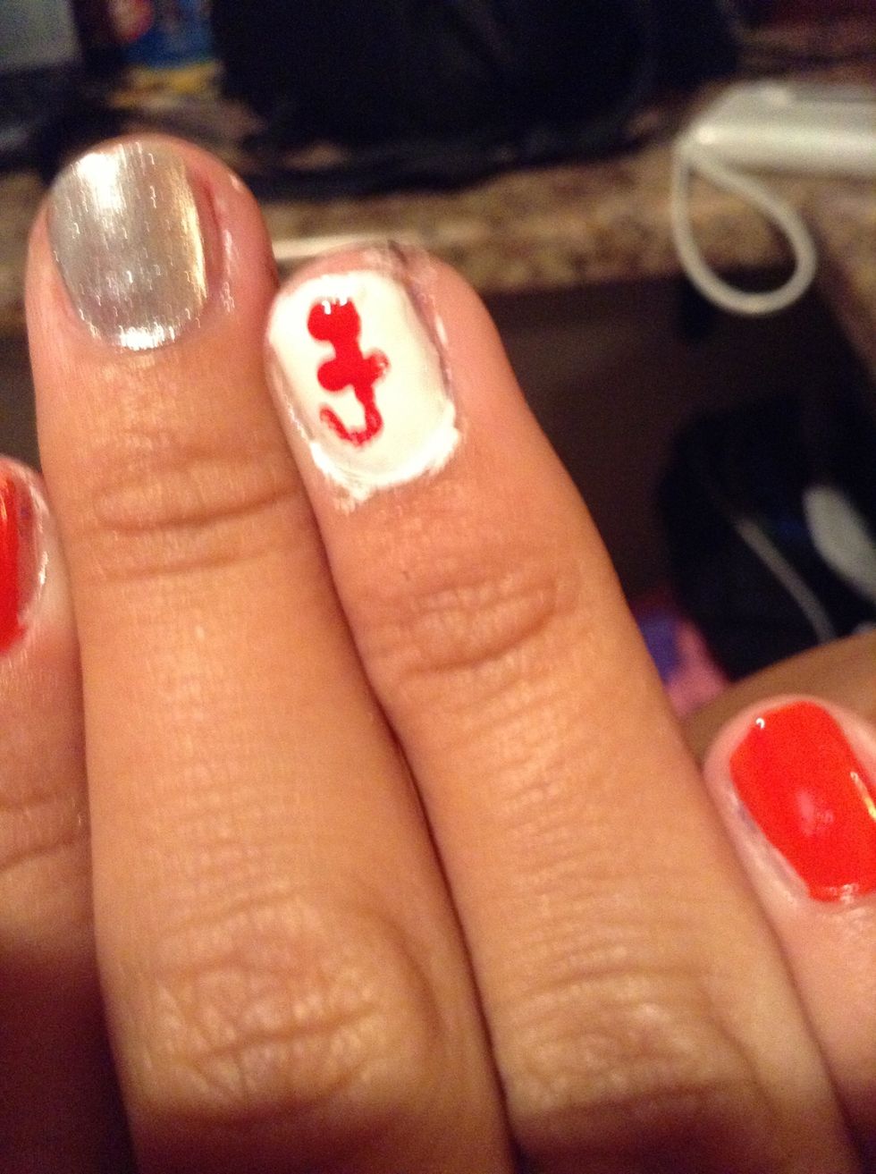 Paint a straight line down. Then across the top. And then curve the bottom to create the anchor.