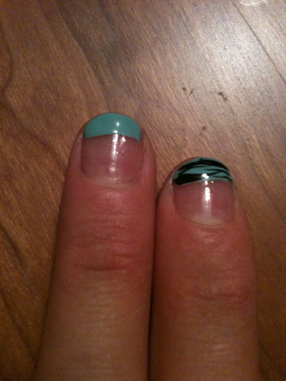 Paint a stripe of blue polish across the nail.