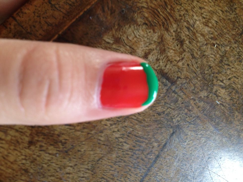 Paint a thick green line at the top of your nail.