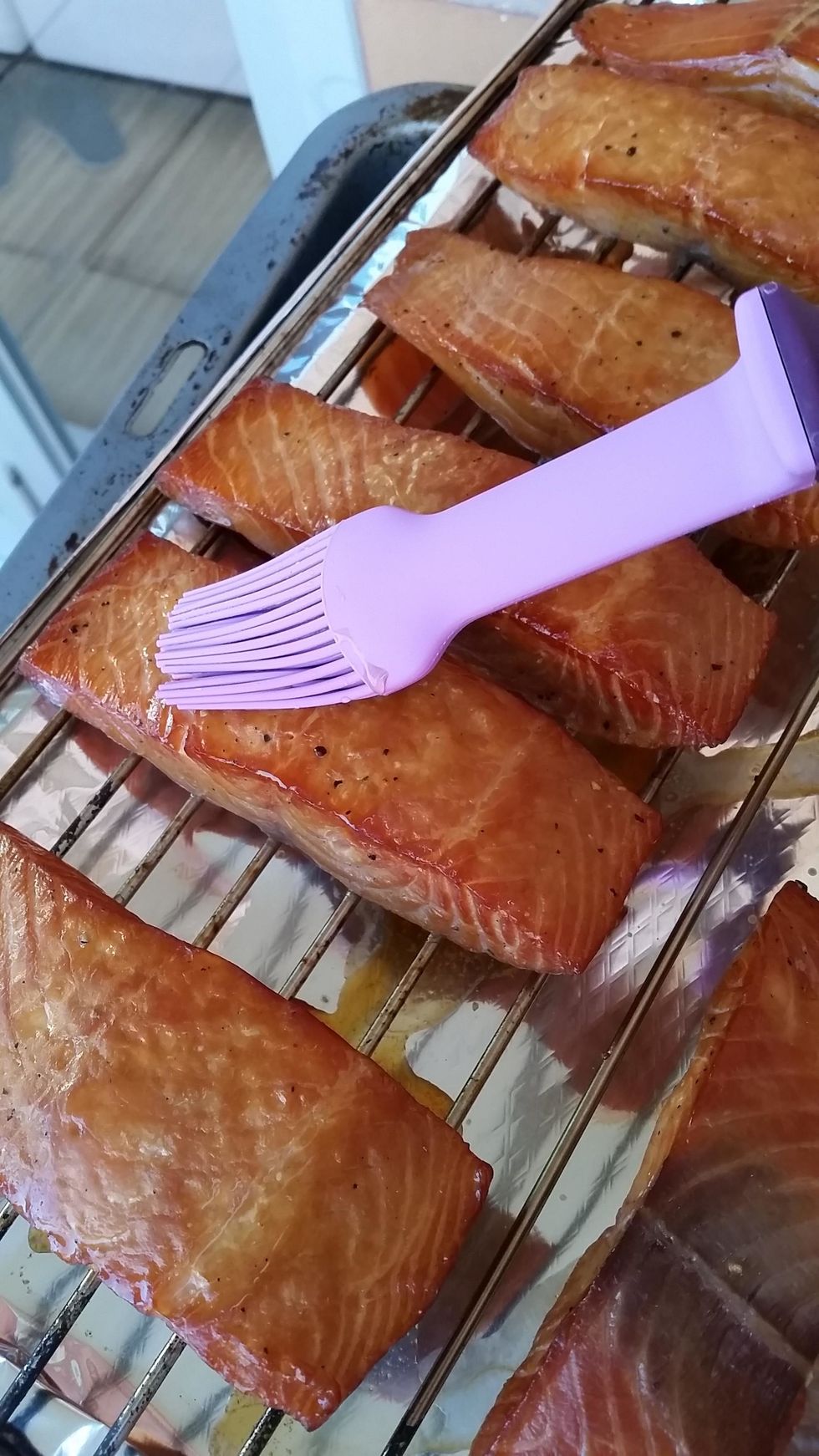 paint a thin coating of the Maple syrup (or honey) onto the Salmon to get a nice glaze and place it back in smoker.