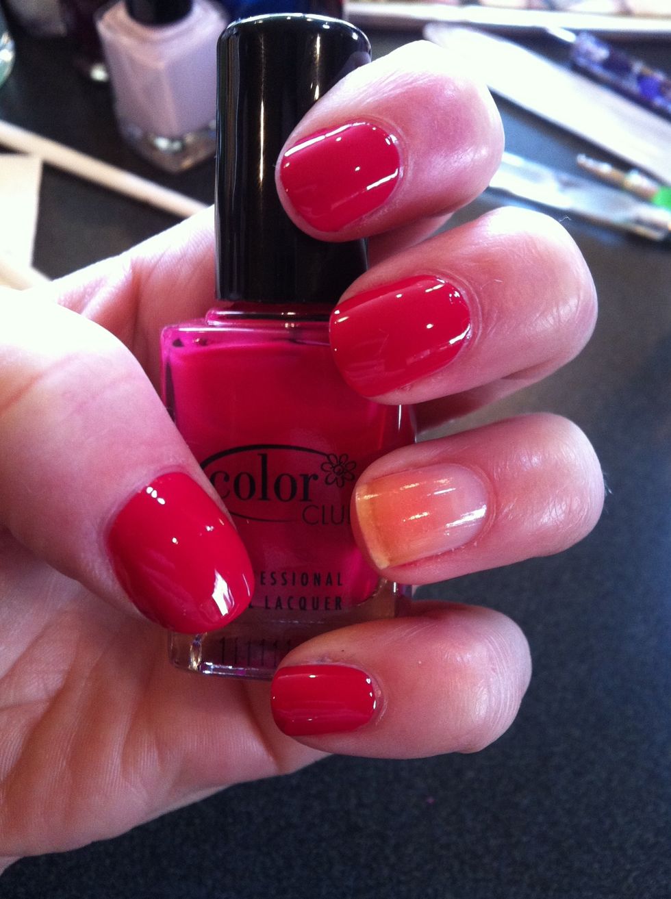 Paint all but your ring finger with two coats of the primary polish you chose.