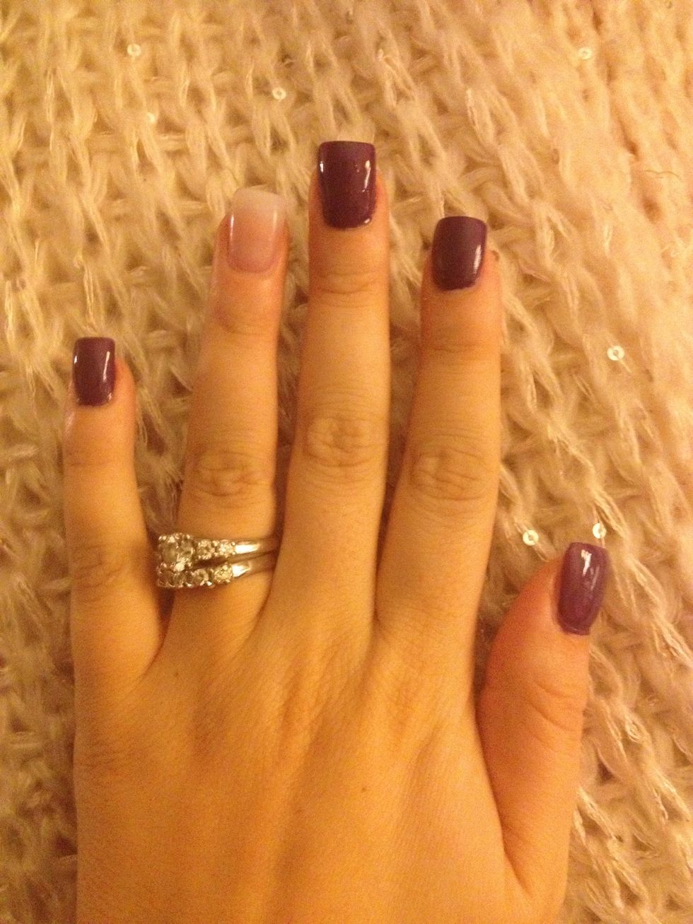 Paint all nails, except ring finger, with purple nail polish and let dry!
