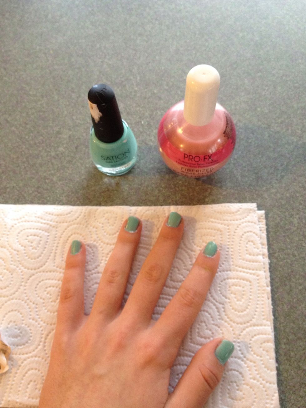 Paint all of your nails with a base coat. Once it's dry, put on two coats of your solid color. I had to use more because my nail polish was kinda see through.