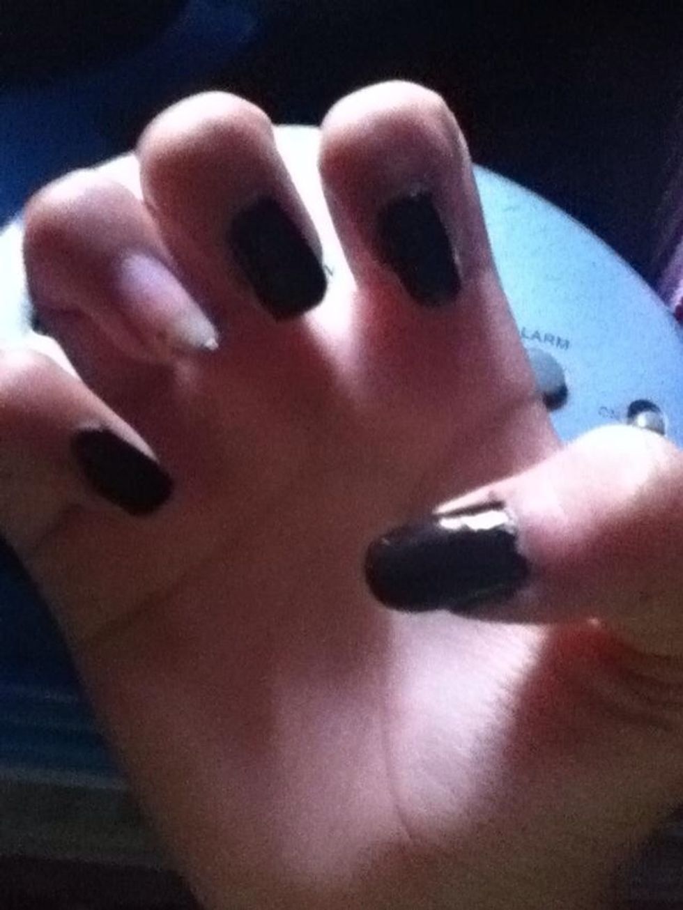 Paint All Your Nails Black But Leave One Open.