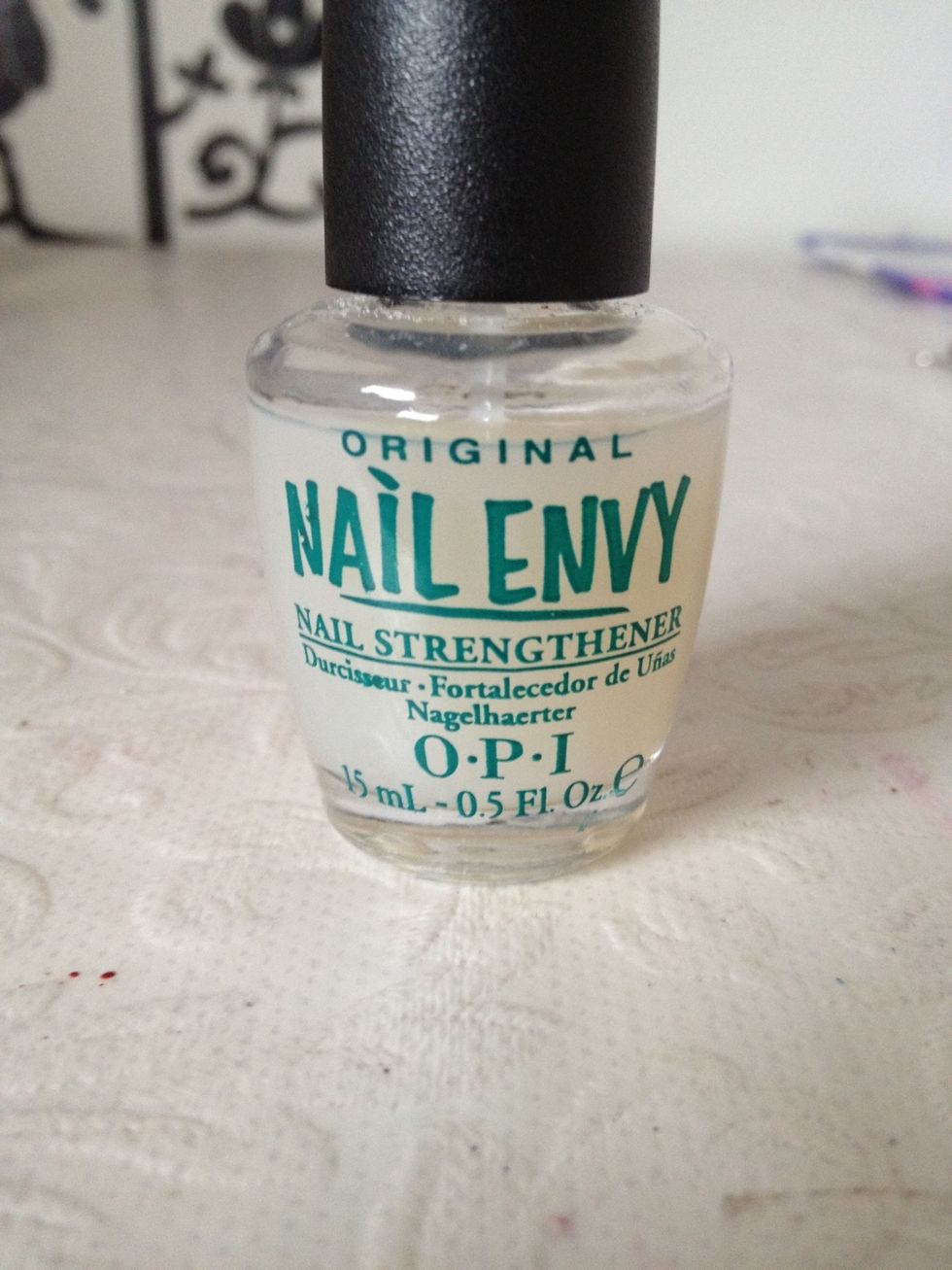 Paint all your nails with your favorite base cost, let dry. I am using OPI Nail envy, but you can use any kind;-)
