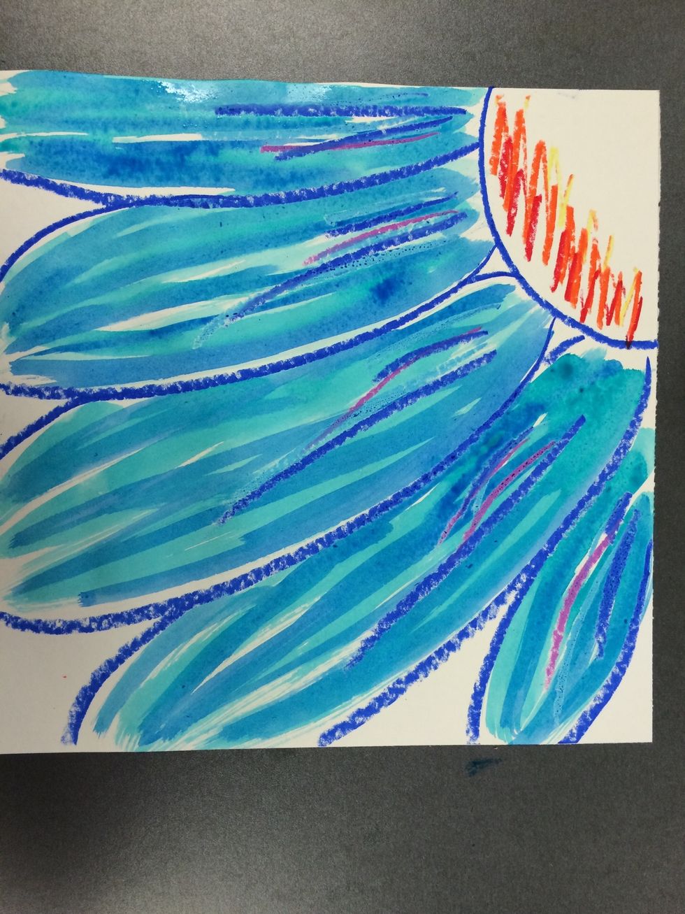 Paint another layer of watercolor on top of the petals. Pick a color that is close to the color you already painted it. (Example: I did blue green first, and then blue on top of that)